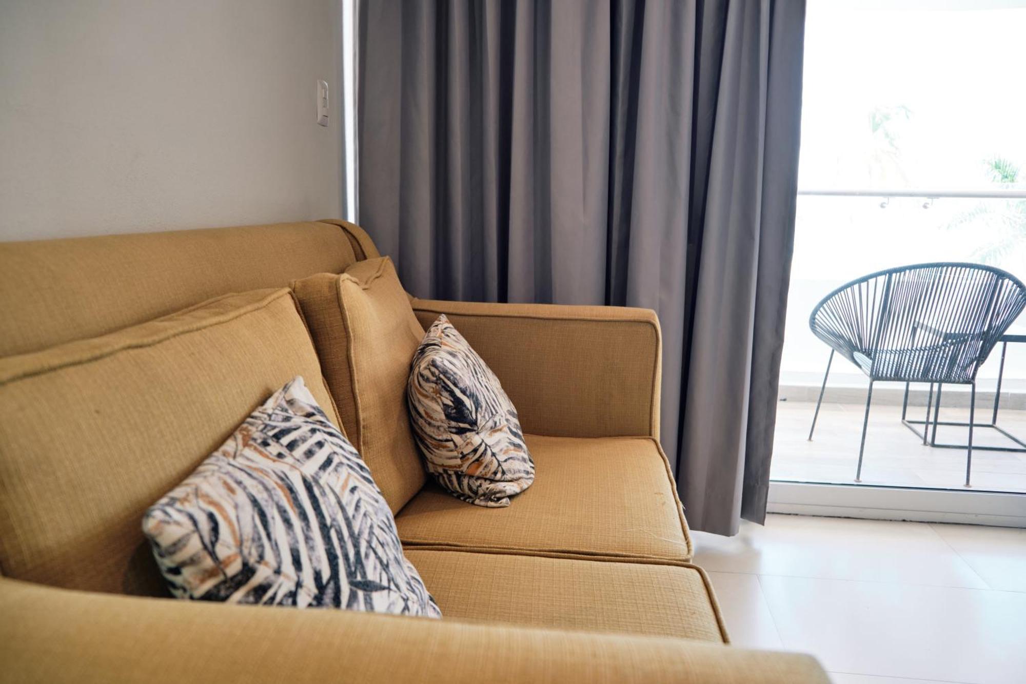 The Inn At Mazatlán Εξωτερικό φωτογραφία A sofa