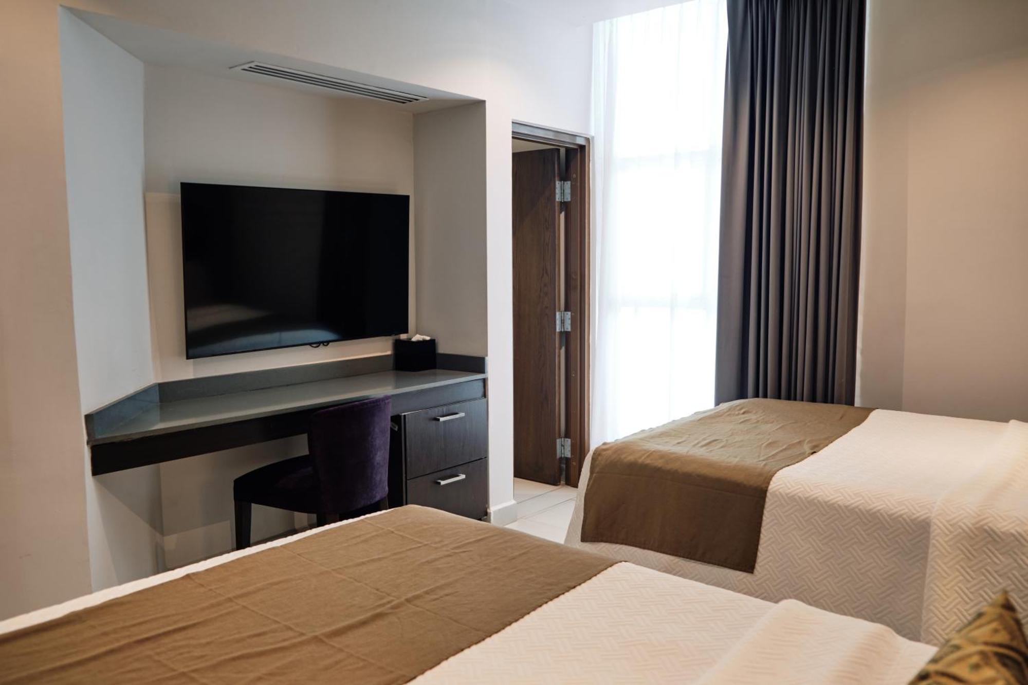 The Inn At Mazatlán Εξωτερικό φωτογραφία A room at the hotel
